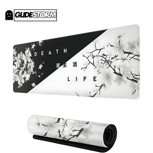 tapis de souris ergonomique avec design floral noir et blanc, texte death life et kanjis au centre, tapis roulé en bas